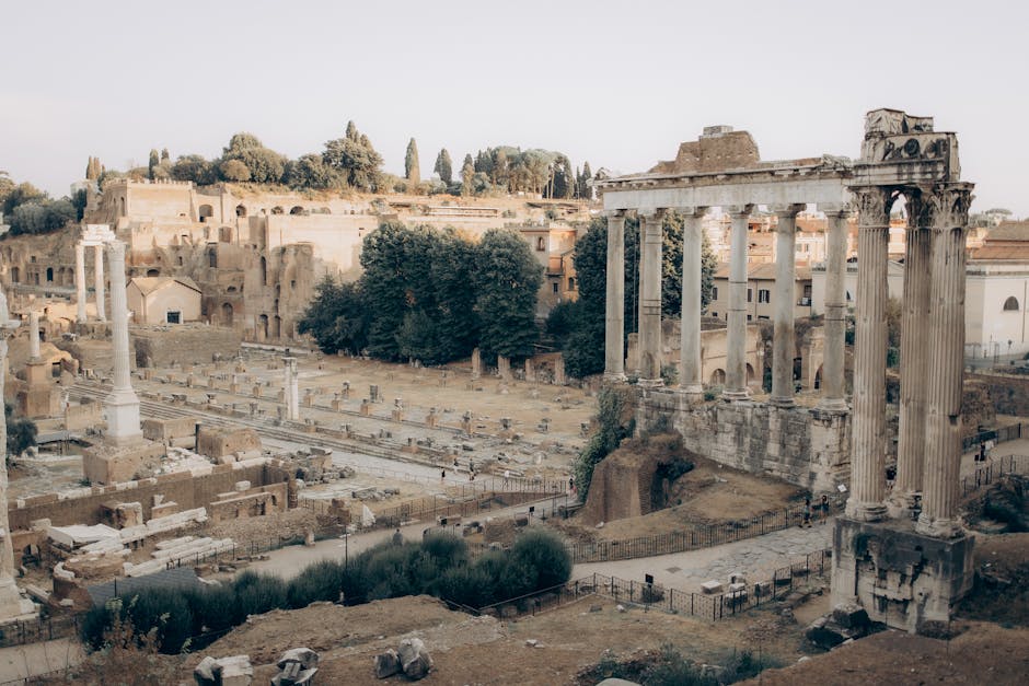 Scenic view of the historic Roman Forum ruins in Rome, Italy at daytime.
